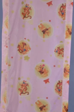 TESSUTO TENDINO WINNIE POOH FONDO ROSA