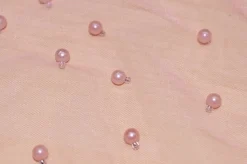 TULLE ROSA CON PERLINE APPLICATE